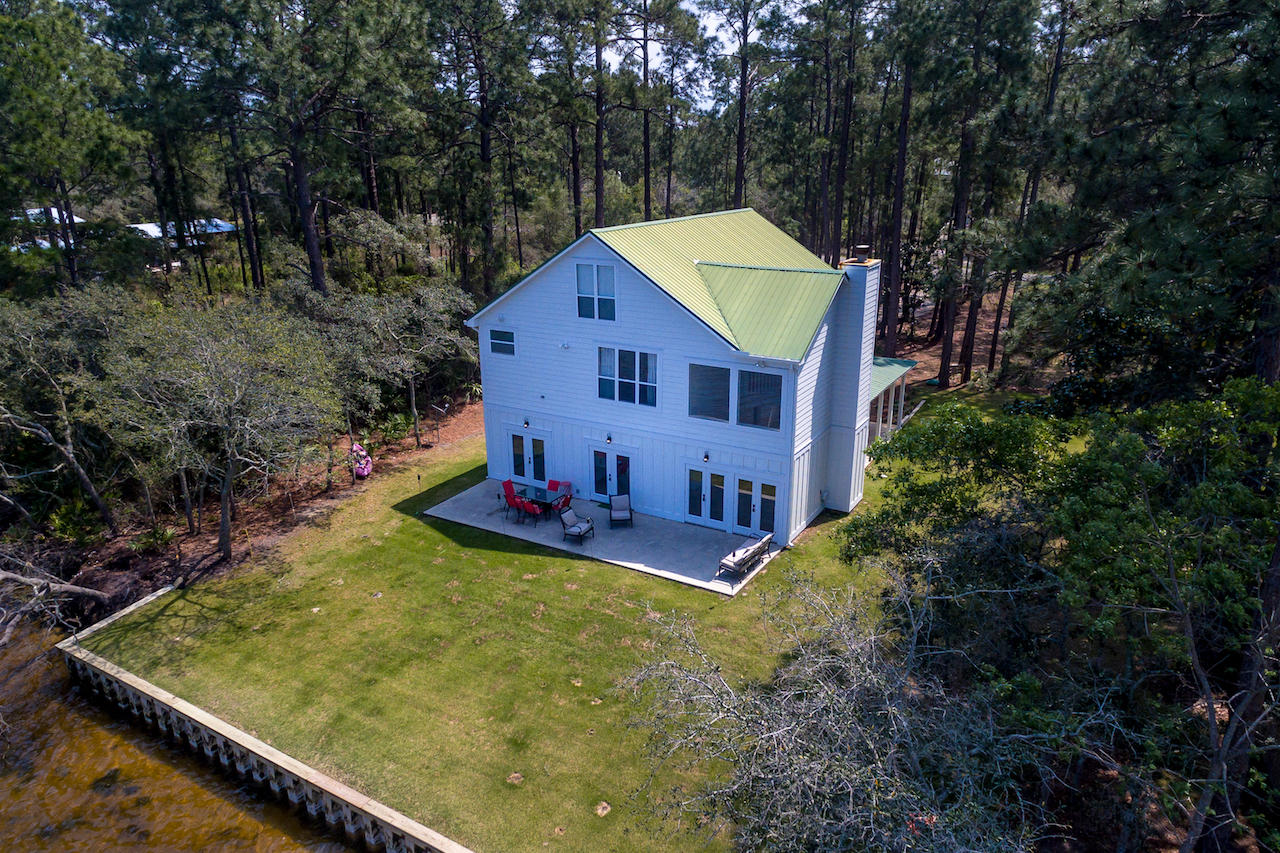 72 Carolyn Lane Santa Rosa Beach, FL 32459 - Photo 25 of 25 a view of a house with pool and a yard