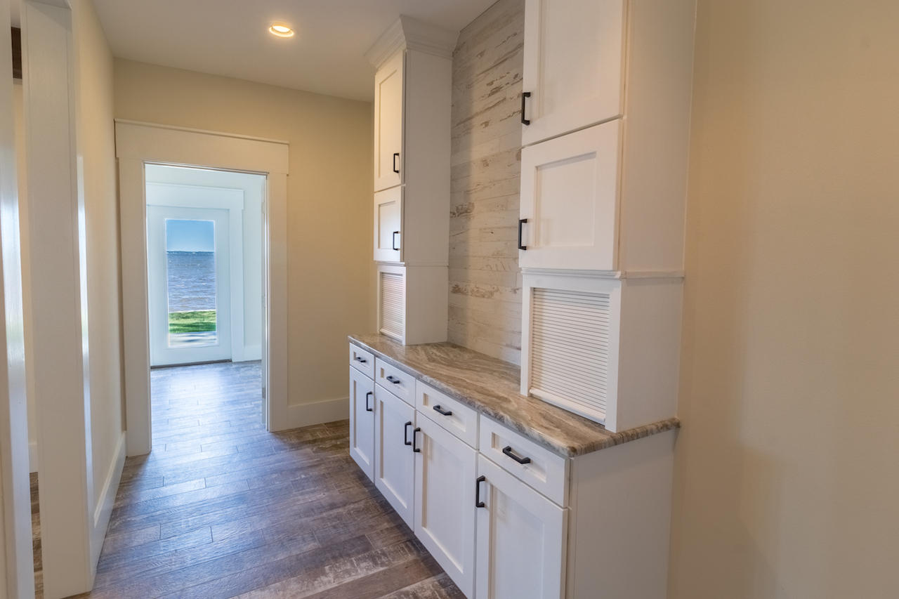 72 Carolyn Lane Santa Rosa Beach, FL 32459 - Photo 7 of 25 a bathroom with a granite countertop sink and a mirror