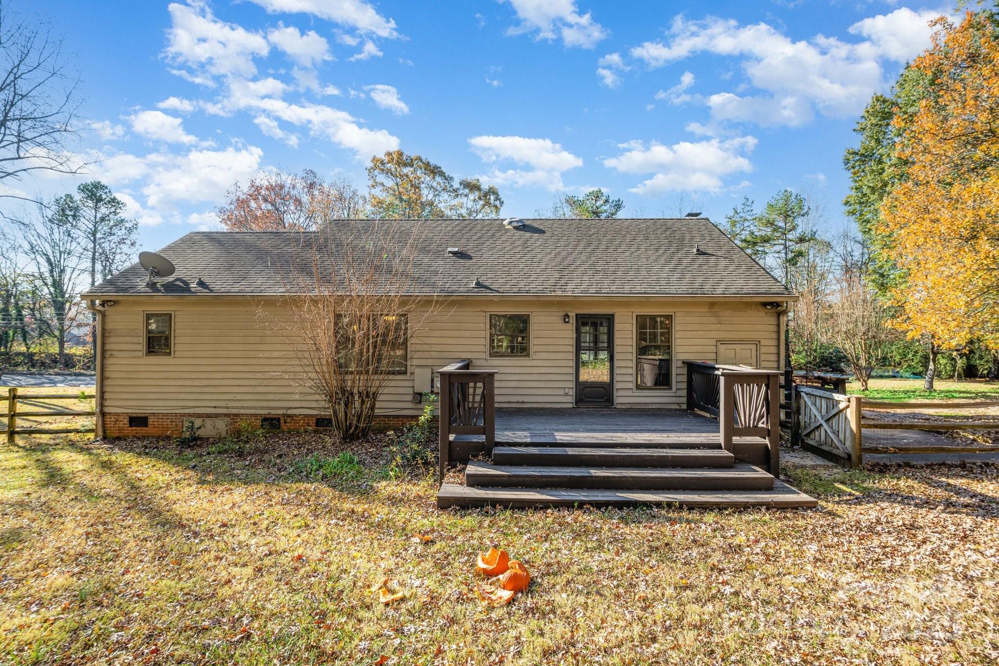 7615 Alexander Road Charlotte, NC 28270 - Photo 19 of 19 a front view of a house with a yard