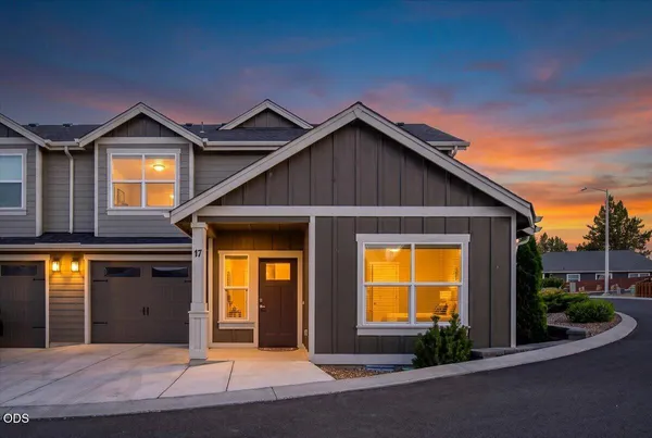 a front view of a house having yard