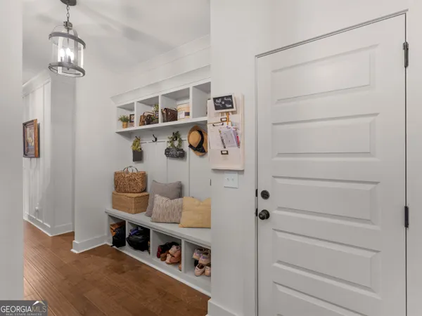 a bathroom with a sink a vanity and a mirror