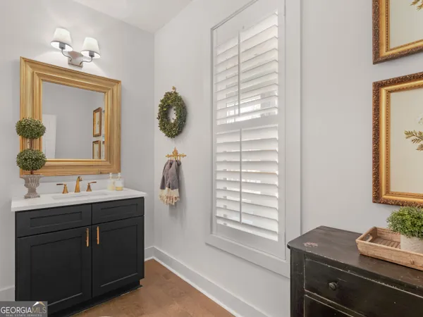 a bedroom with a bed couch and window