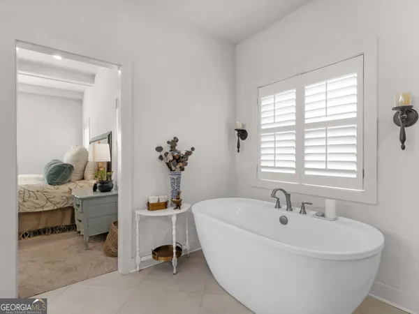 a bathroom with a shower and toilet