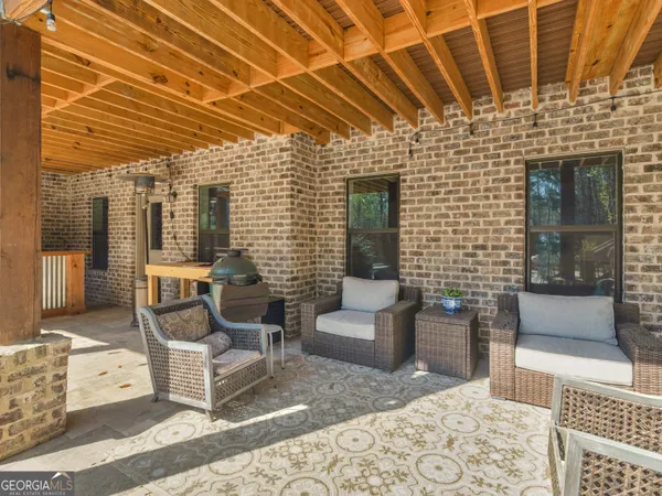 a view of swimming pool with chairs