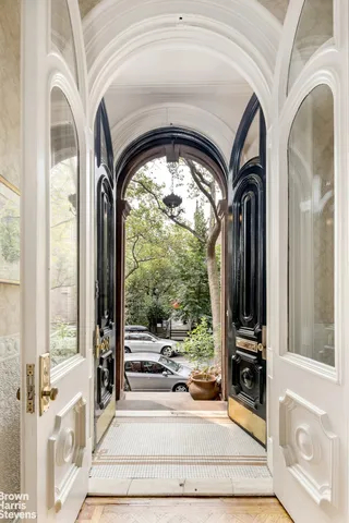 a view of living room and entry gate