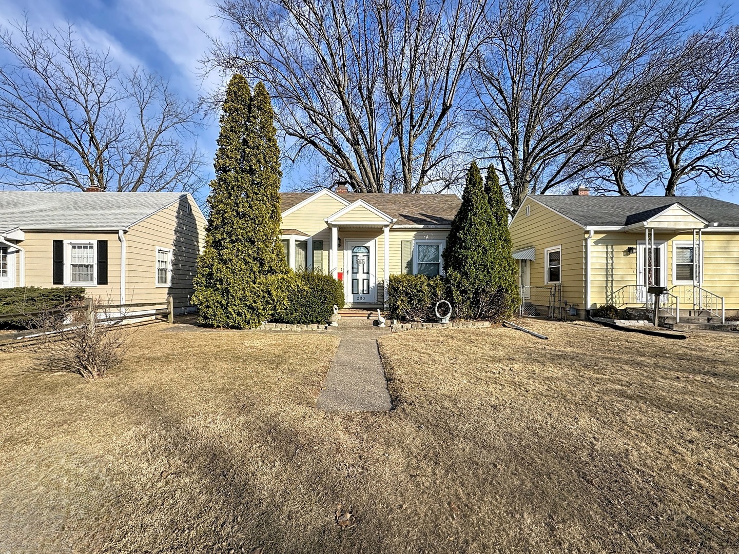 a house with trees in front of it