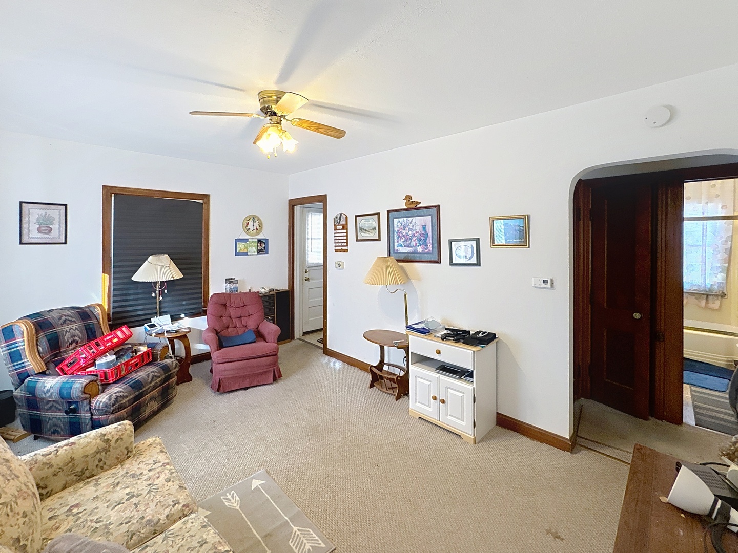 2110 2nd Street Moline, IL 61265 - Photo 2 of 5 a bedroom with bed and a couch