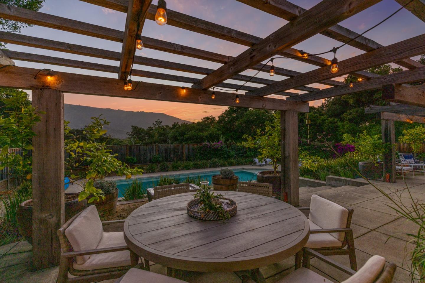 58 La Rancheria Carmel Valley, CA 93924 - Photo 29 of 36 a view of a porch with furniture and a backyard
