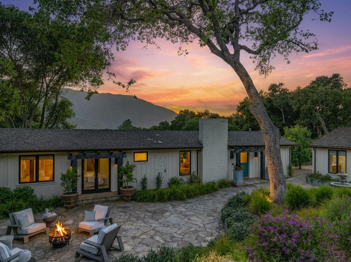 58 La Rancheria Carmel Valley, CA 93924 - Photo 30 of 36 a front view of a house with outdoor seating