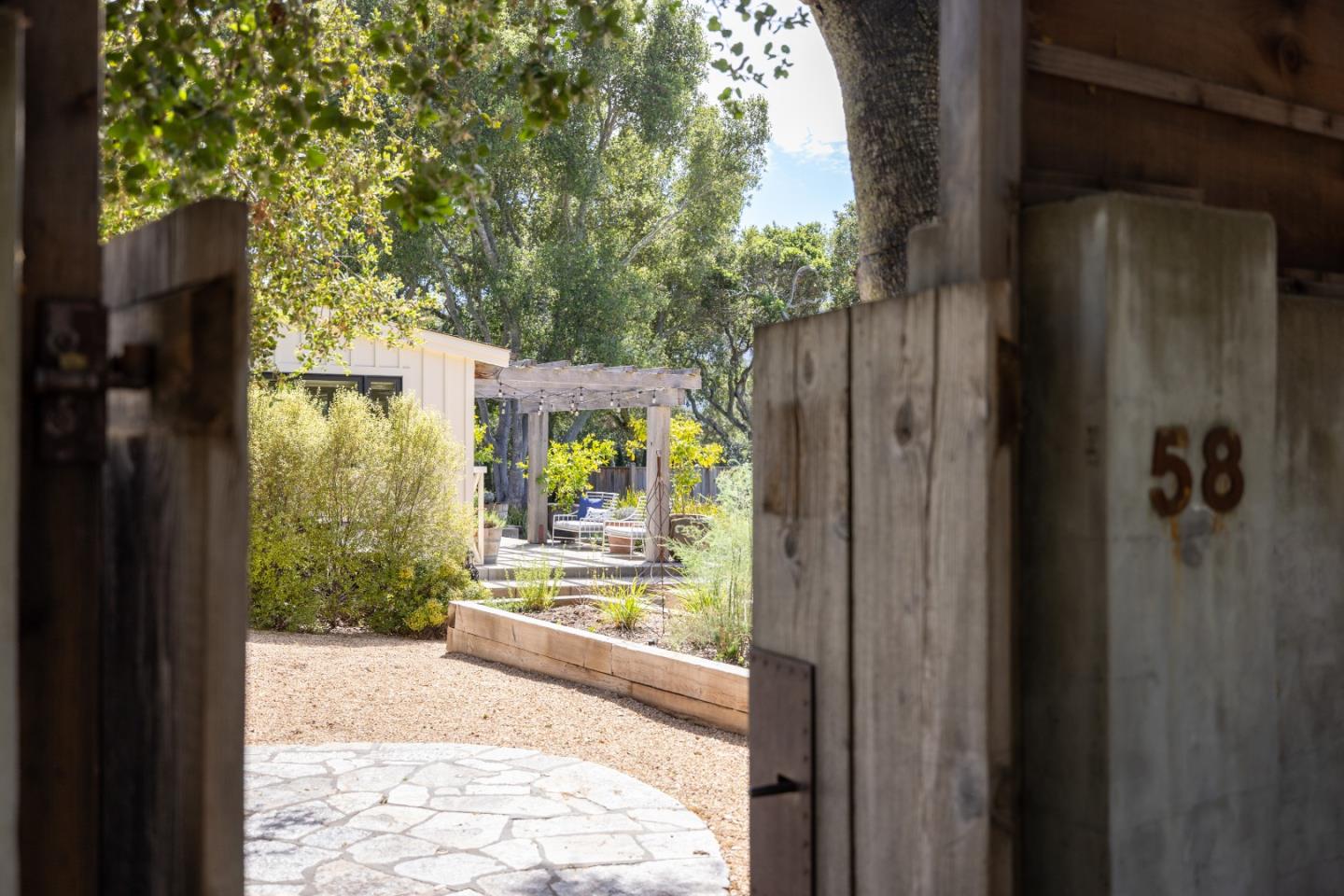 58 La Rancheria Carmel Valley, CA 93924 - Photo 32 of 36 a view of a door and a porch