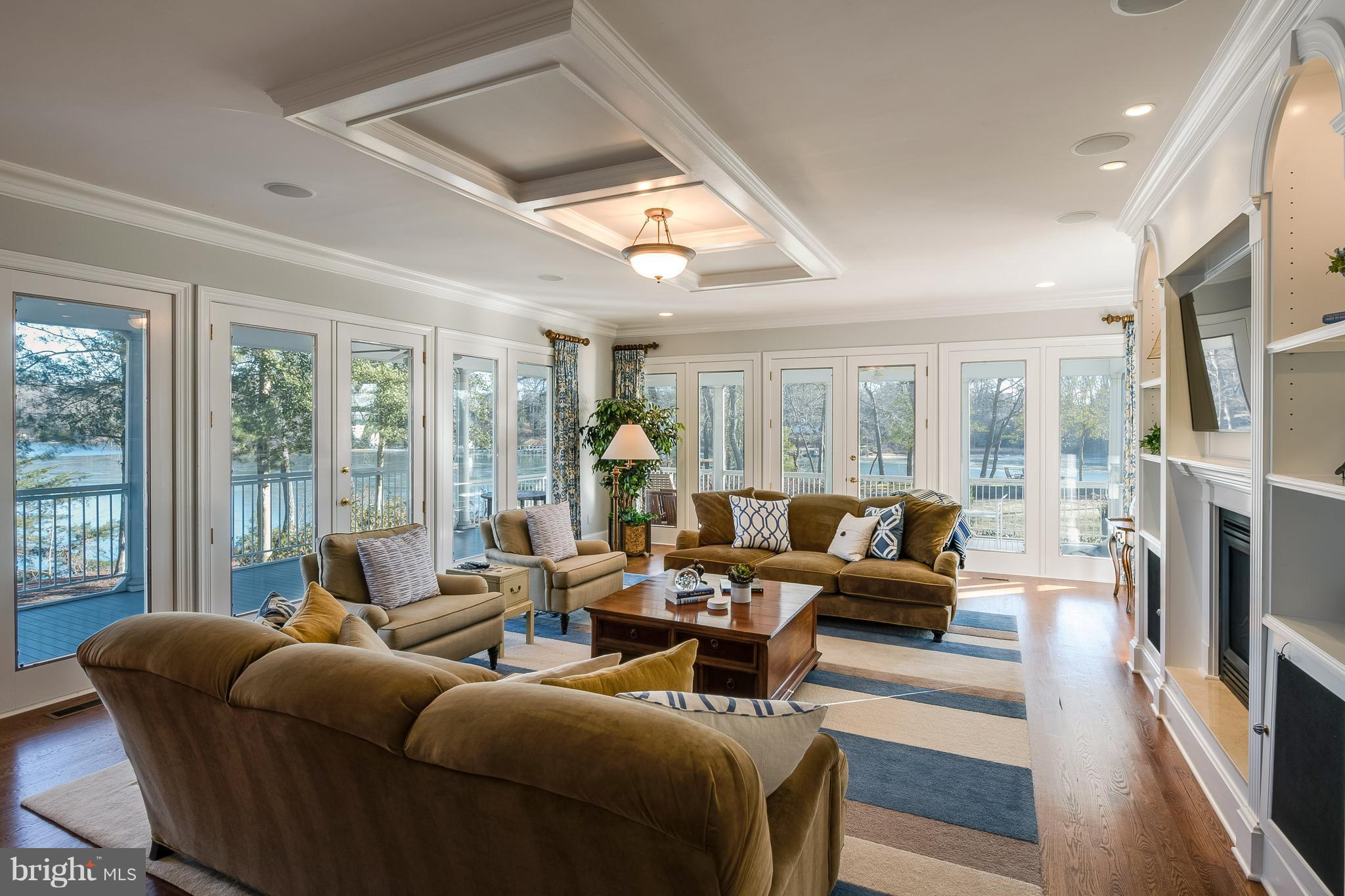 49 Poplar Point Road Edgewater, MD 21037 - Photo 11 of 30 Family Room with double sided fireplace