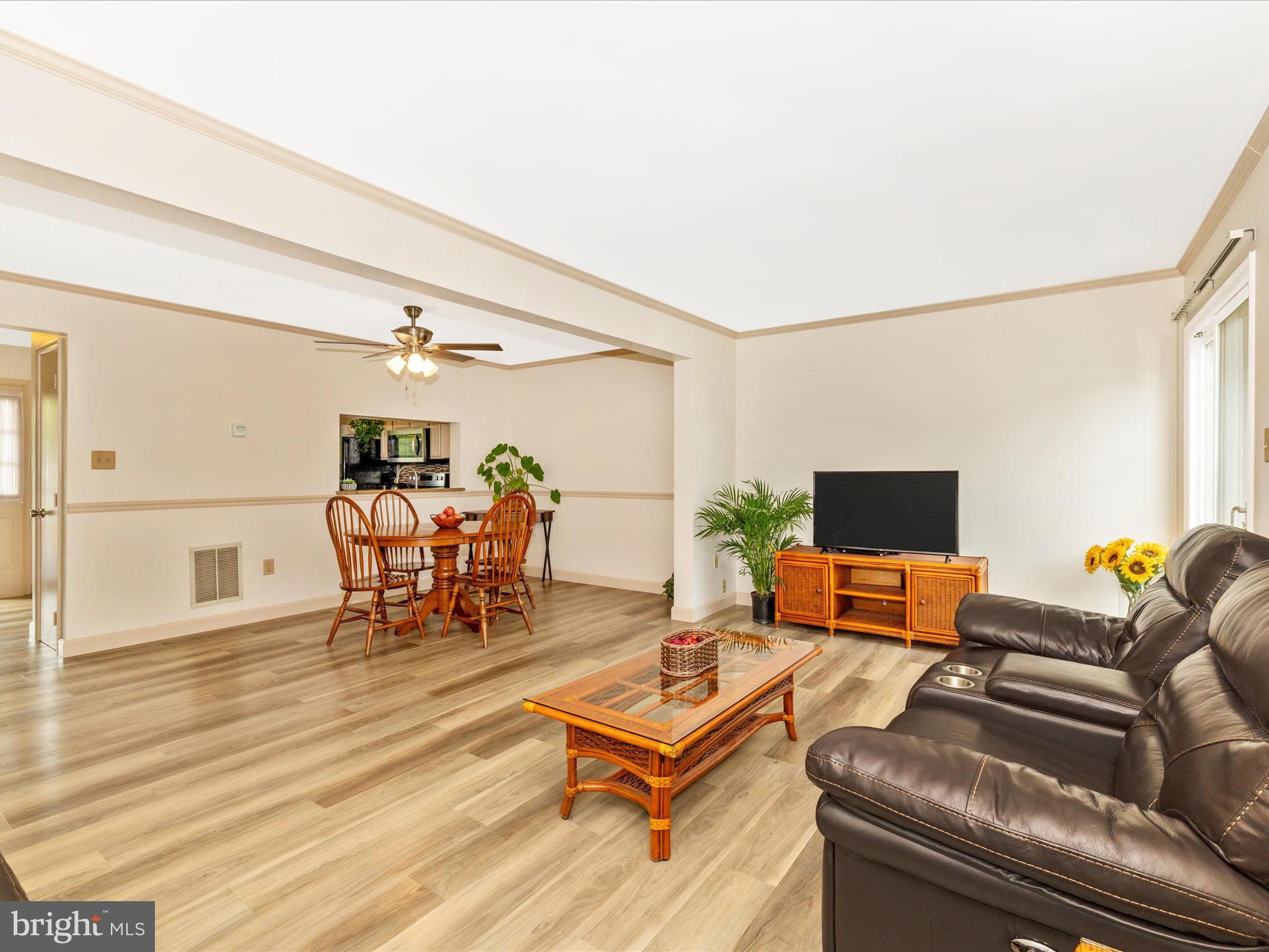 6739 Killdeer Court Frederick, MD 21703 - Photo 16 of 38 a living room with furniture and wooden floor