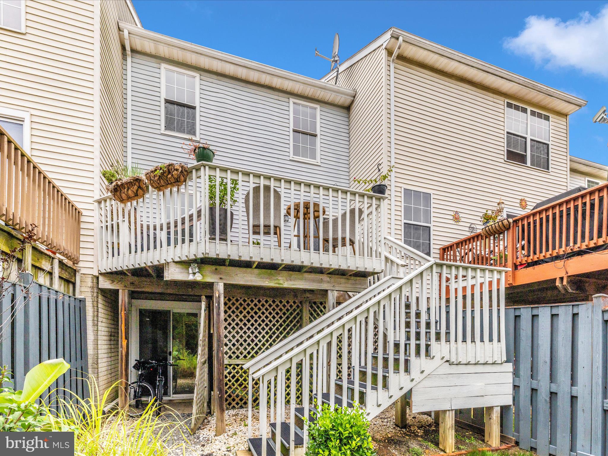 6739 Killdeer Court Frederick, MD 21703 - Photo 33 of 38 a view of a house with wooden deck