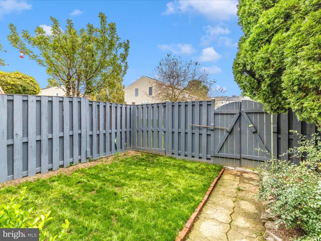 a view of a backyard with a small cabin