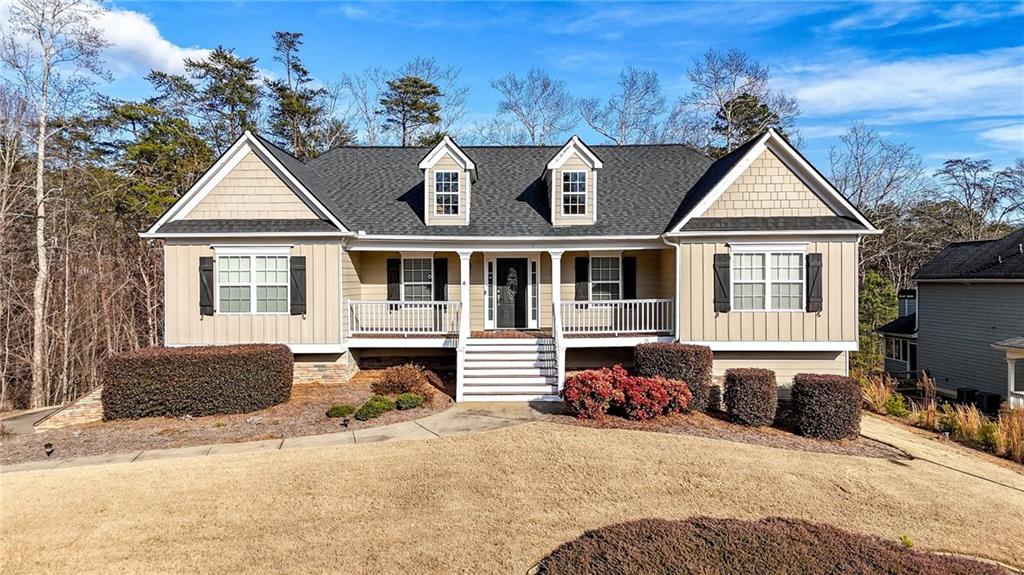309 Winnipeg Court Canton, GA 30114 - Photo 1 of 1 a house view with a garden space