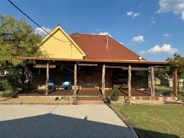 front view of a house with a patio