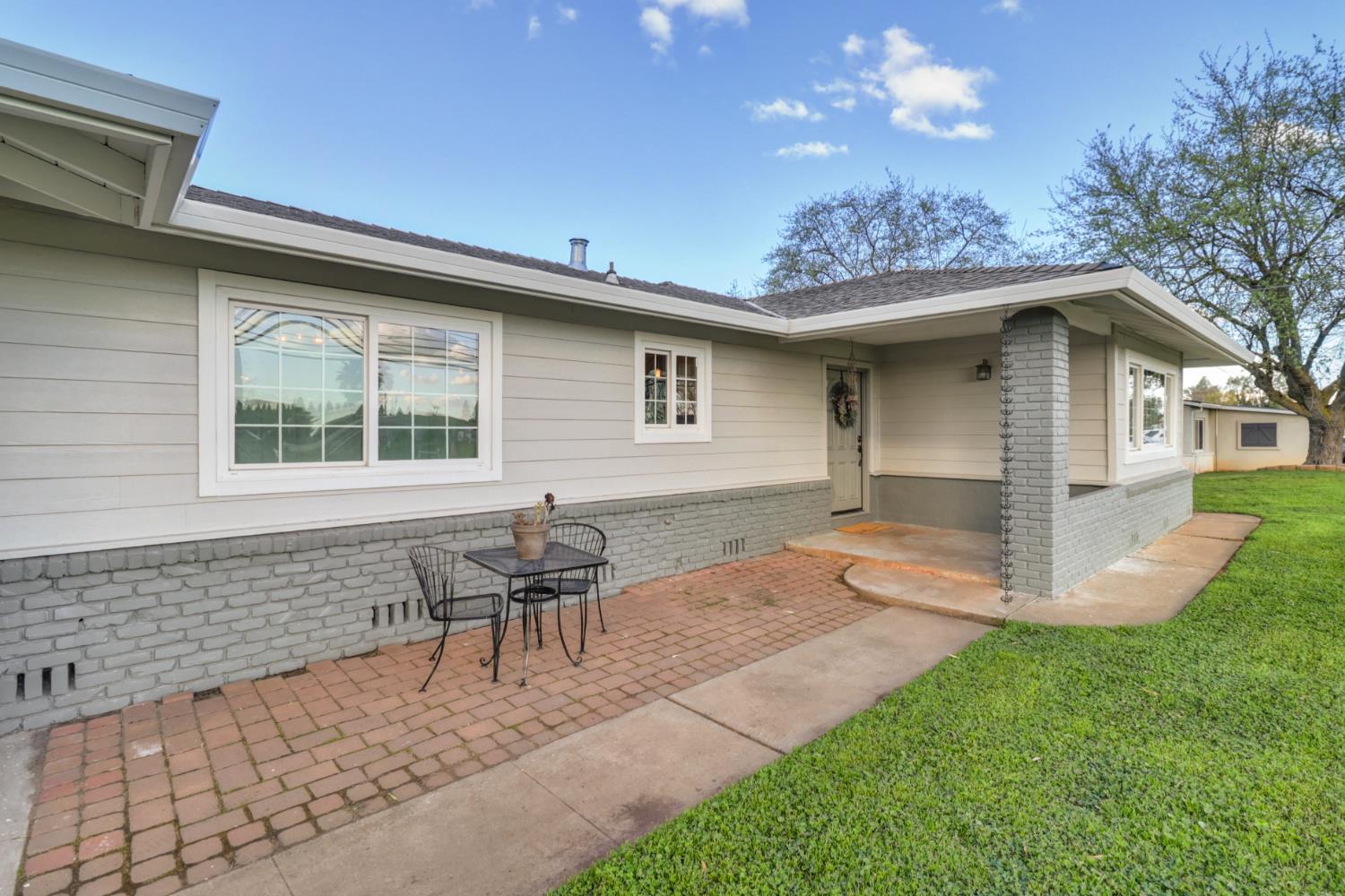 10691 Calvine Road Sacramento, CA 95830 - Photo 4 of 47 a view of a house with a patio