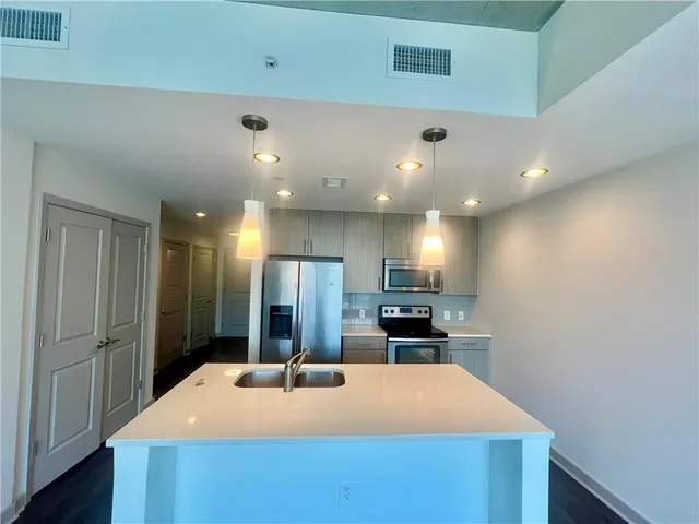 a view of a room with a hallway