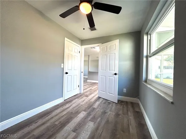 a view of an empty room and window