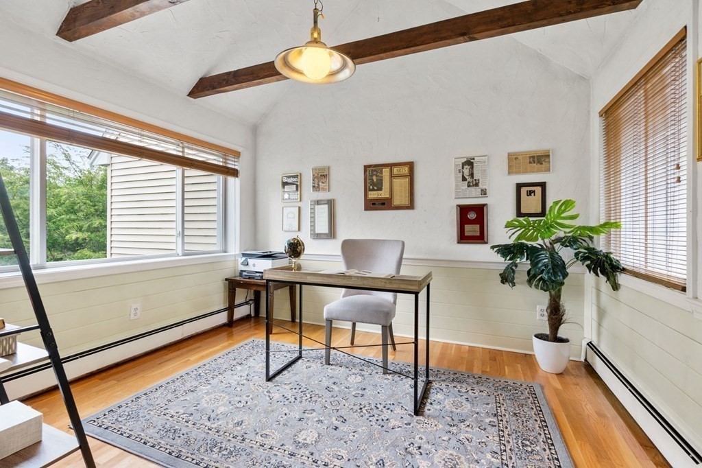 96 Bridge Street Medfield, MA 02052 - Photo 17 of 41 a view of a workspace with furniture and a potted plant