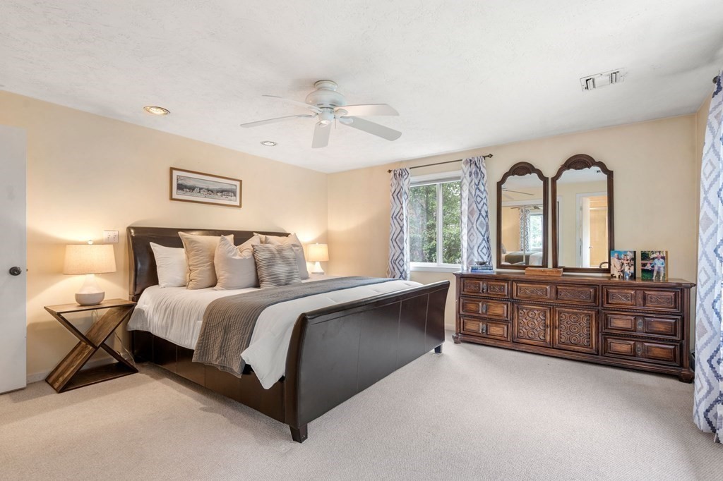 96 Bridge Street Medfield, MA 02052 - Photo 20 of 41 a bed room with a bed and a dresser