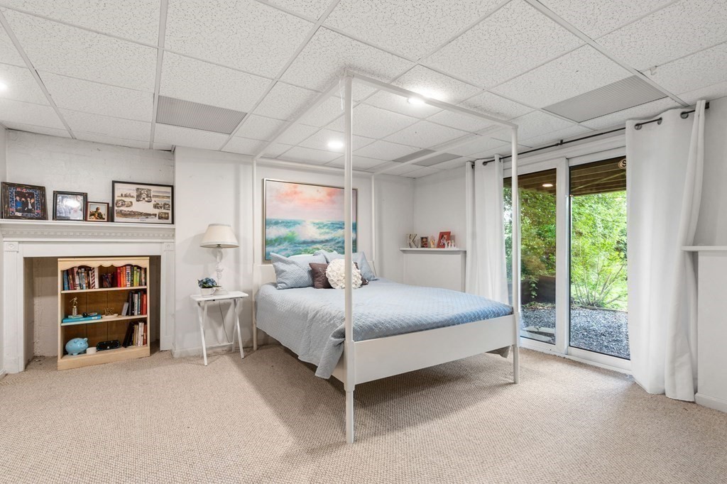 96 Bridge Street Medfield, MA 02052 - Photo 25 of 41 a bedroom with a bed and a large window