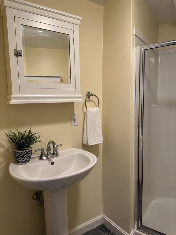 96 Bridge Street Medfield, MA 02052 - Photo 31 of 41 a bathroom with a sink and mirror