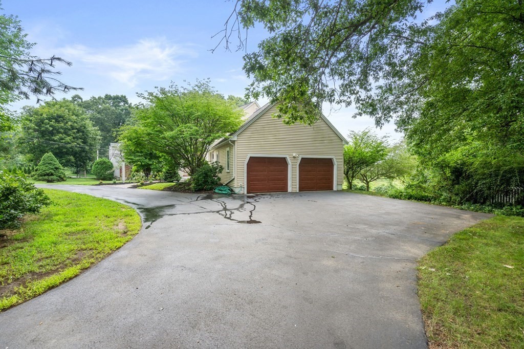 96 Bridge Street Medfield, MA 02052 - Photo 34 of 41 a view of a house with yard and a tree