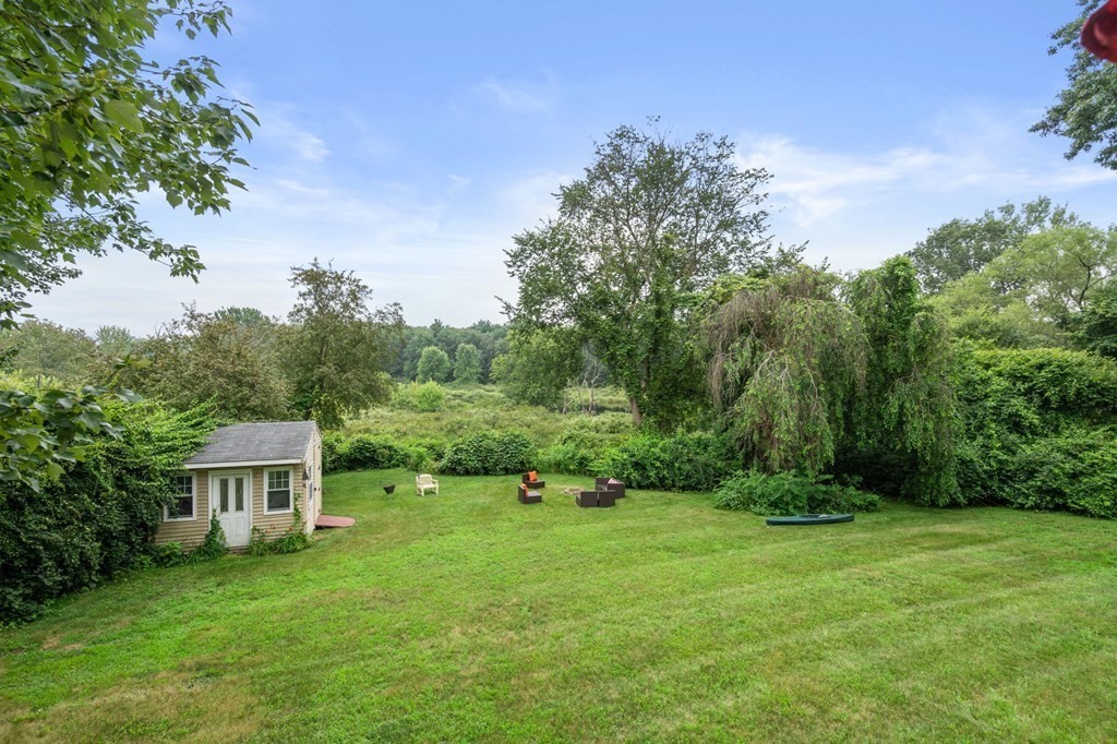96 Bridge Street Medfield, MA 02052 - Photo 35 of 41 a view of a garden with large trees