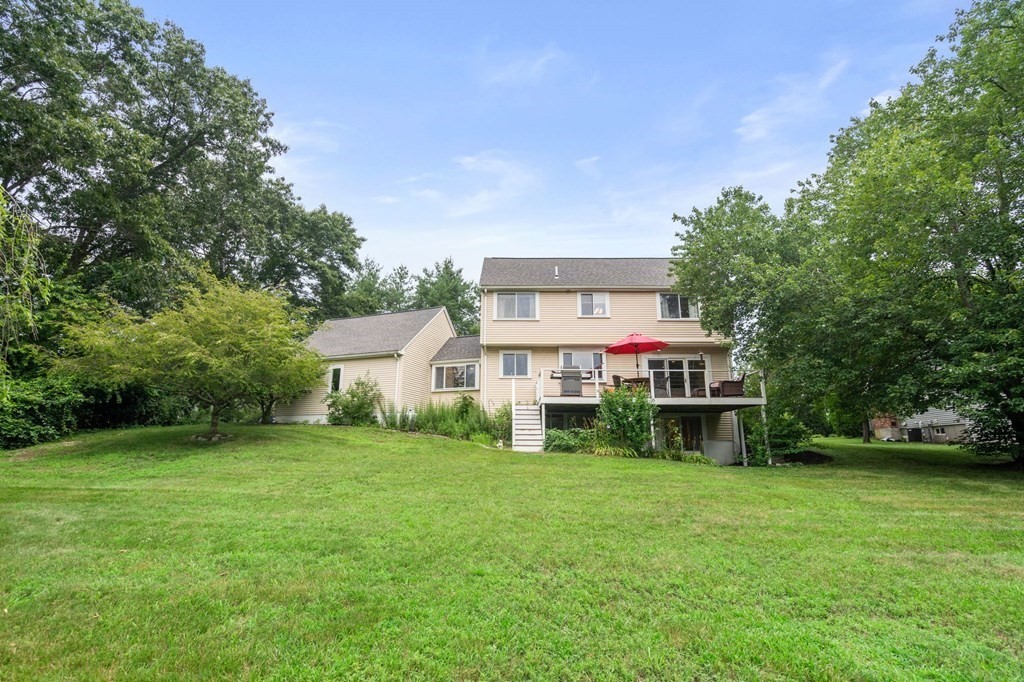 96 Bridge Street Medfield, MA 02052 - Photo 38 of 41 a view of a house with a yard and sitting area