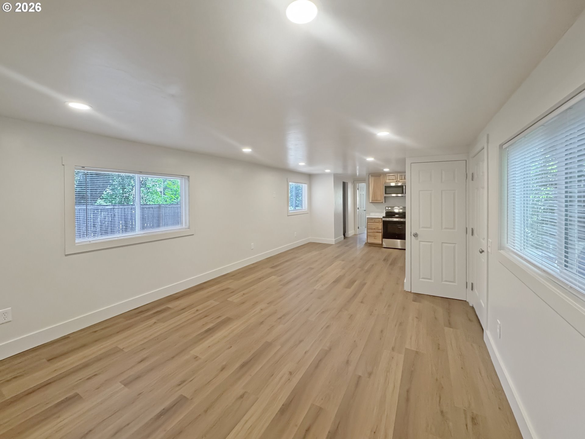 53945 Highway 86 Halfway, OR 97834 - Photo 39 of 48 a view of empty room with wooden floor and fan