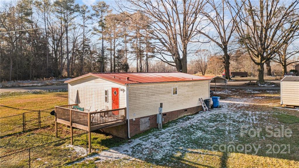 4507 Morgan Mill Road Monroe, NC 28110 - Photo 27 of 33 a view of a terrace with trees