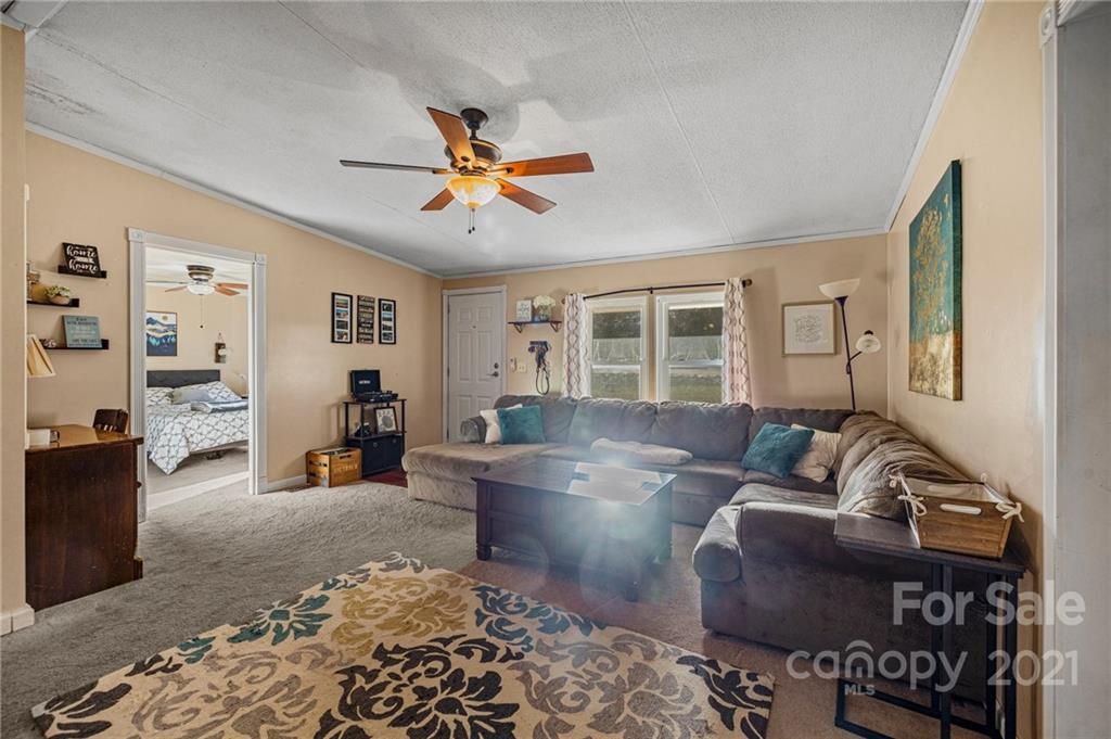 4507 Morgan Mill Road Monroe, NC 28110 - Photo 7 of 33 a living room with furniture and a window