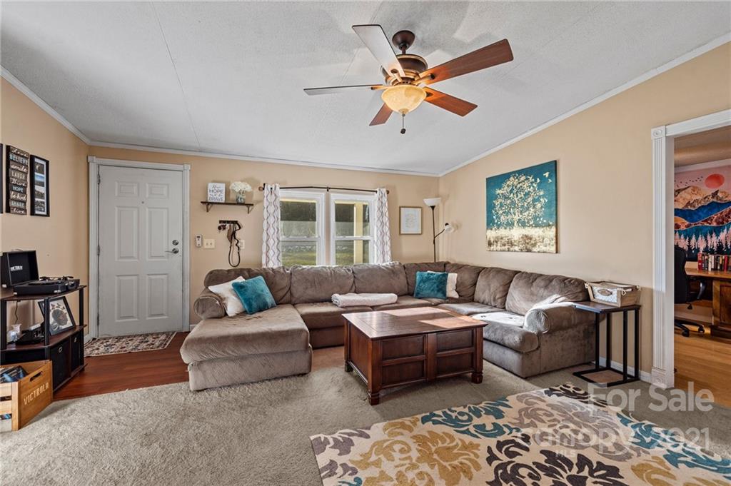 4507 Morgan Mill Road Monroe, NC 28110 - Photo 8 of 33 a living room with furniture and a window