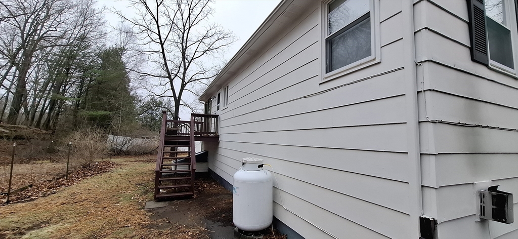 32 3rd Street Webster, MA 01570 - Photo 11 of 13 a view of a back yard of the house