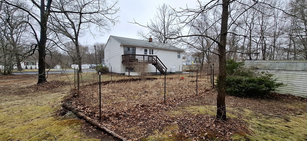 32 3rd Street Webster, MA 01570 - Photo 13 of 13 a backyard of a house with lots of green space