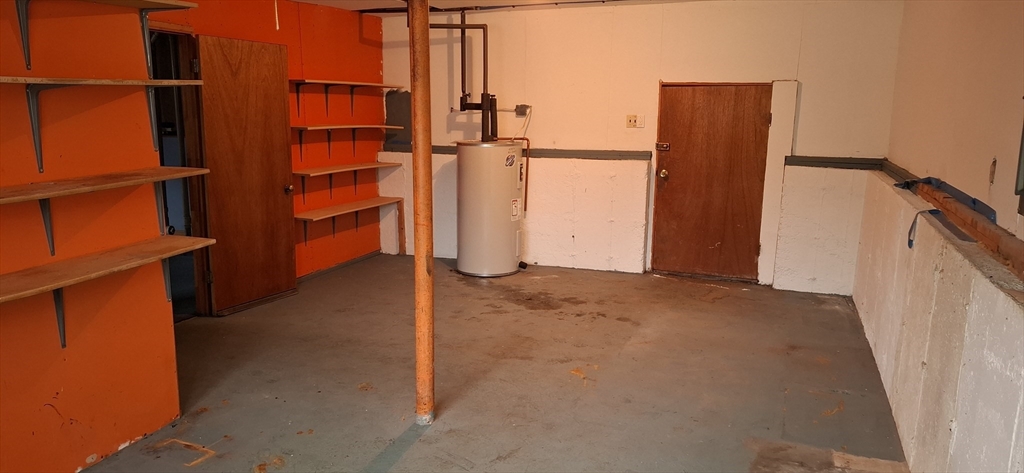 32 3rd Street Webster, MA 01570 - Photo 9 of 13 front view of a house with a door