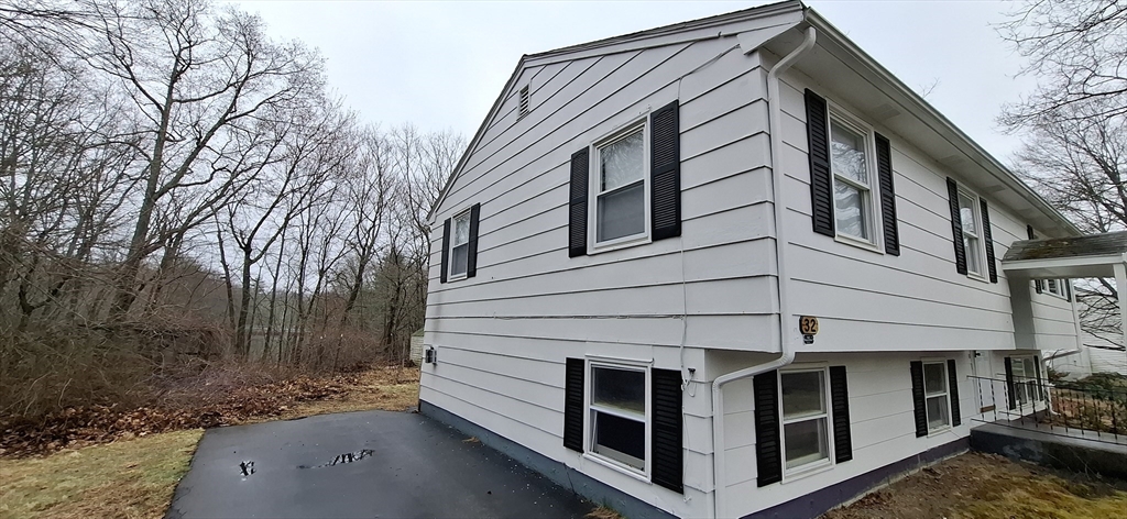 32 3rd Street Webster, MA 01570 - Photo 10 of 13 a view of a house with a yard