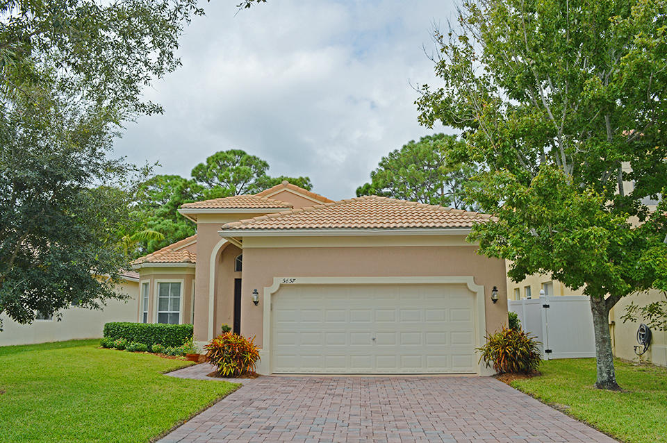 5657 Spanish River Road Fort Pierce, FL 34951 - Photo 3 of 62 Front Featuring Garage