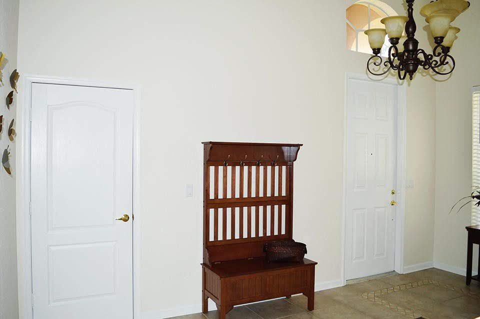 5657 Spanish River Road Fort Pierce, FL 34951 - Photo 8 of 62 Front Living Room 01