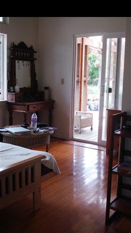 367 Hoolawa Road Haiku, HI 96708 - Photo 20 of 30 a dining room with furniture and wooden floor