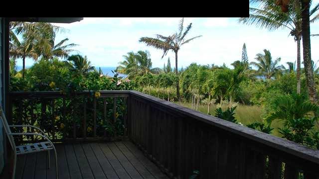 367 Hoolawa Road Haiku, HI 96708 - Photo 7 of 30 a balcony with wooden floor