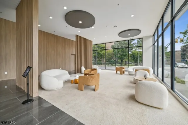 a living room with patio and a large window