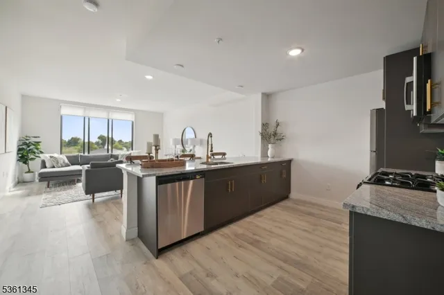a kitchen with counter top space and cabinets