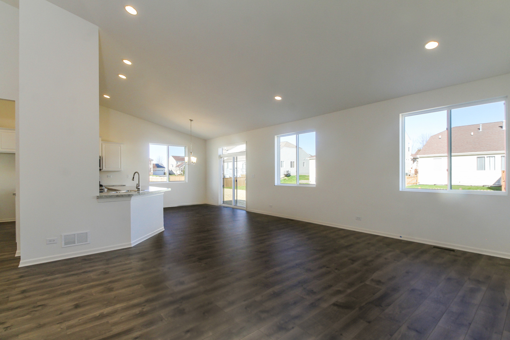 2080 Brandon Hill Road New Lenox, IL 60451 - Photo 7 of 15 an empty room with wooden floor and windows