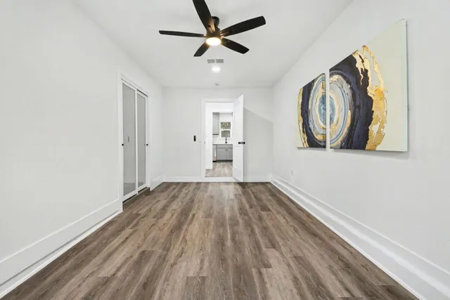 a view of a house with a snow in the yard