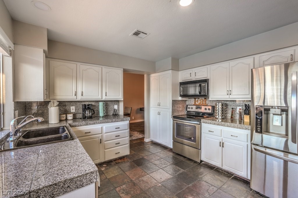 5198 Hibbetts Drive Las Vegas, NV 89103 - Photo 4 of 46