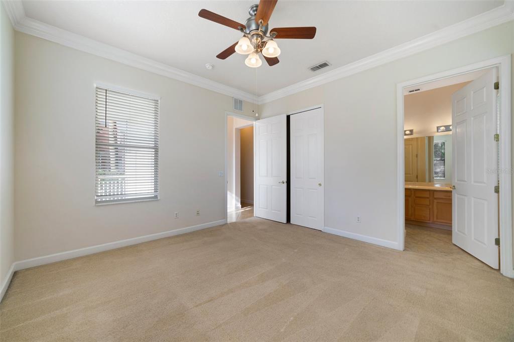 7740 Linkside Loop Reunion, FL 34747 - Photo 13 of 34 a view of an empty room with a window