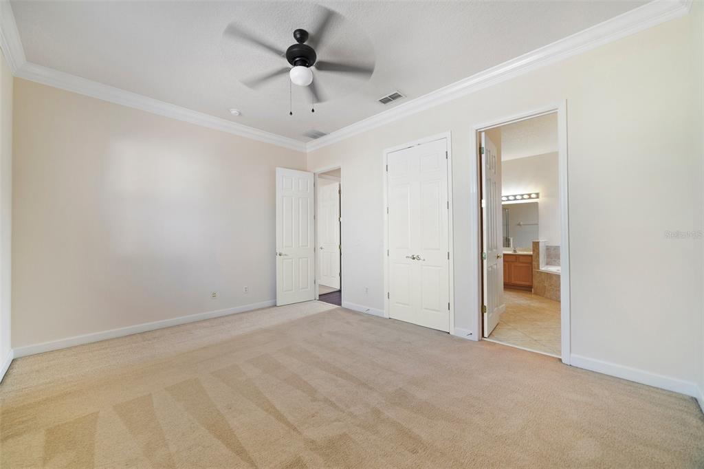 7740 Linkside Loop Reunion, FL 34747 - Photo 22 of 34 a view of an empty room and a bathroom