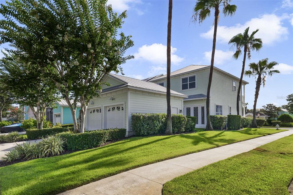7740 Linkside Loop Reunion, FL 34747 - Photo 32 of 34 a front view of house with yard and green space